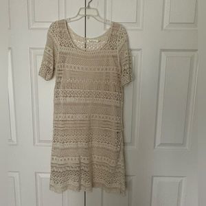 Medium Solitaire crocheted cream colored pull over dress.